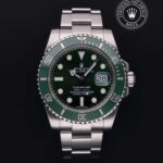 Green-dial stainless steel diver-style watch
