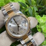 Silver-dial stainless steel watch (different angle)