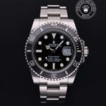 Black-dial stainless steel diver-style watch