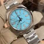 Turquoise/ice-blue dial stainless steel watch