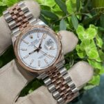 White-dial stainless steel watch (different angle)