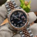 Black-dial stainless steel sports watch