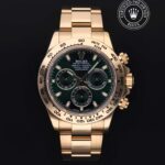 Gold-tone green-dial luxury sports watch